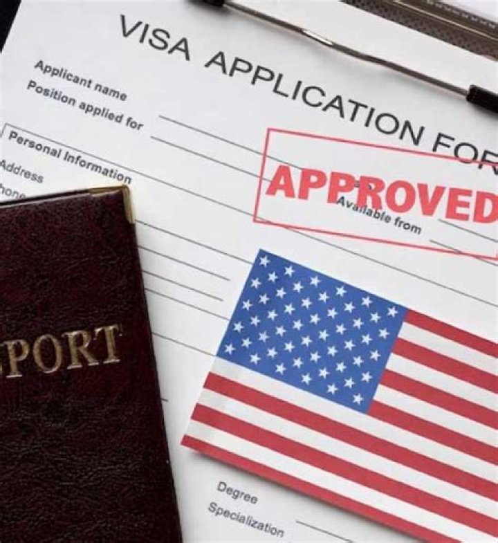 Can I take my wife to USA on work visa?