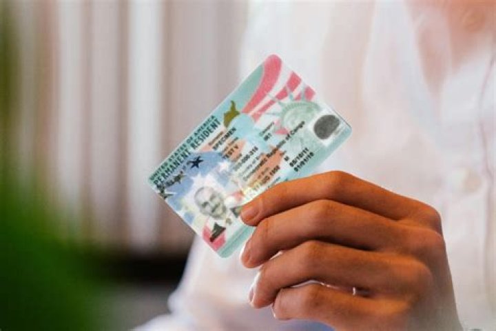 Can I work for any company with a green card?